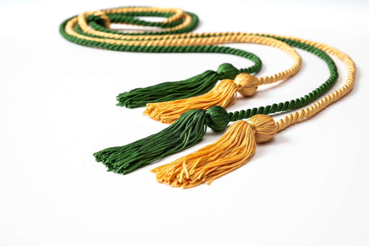 commemorative green and gold cords